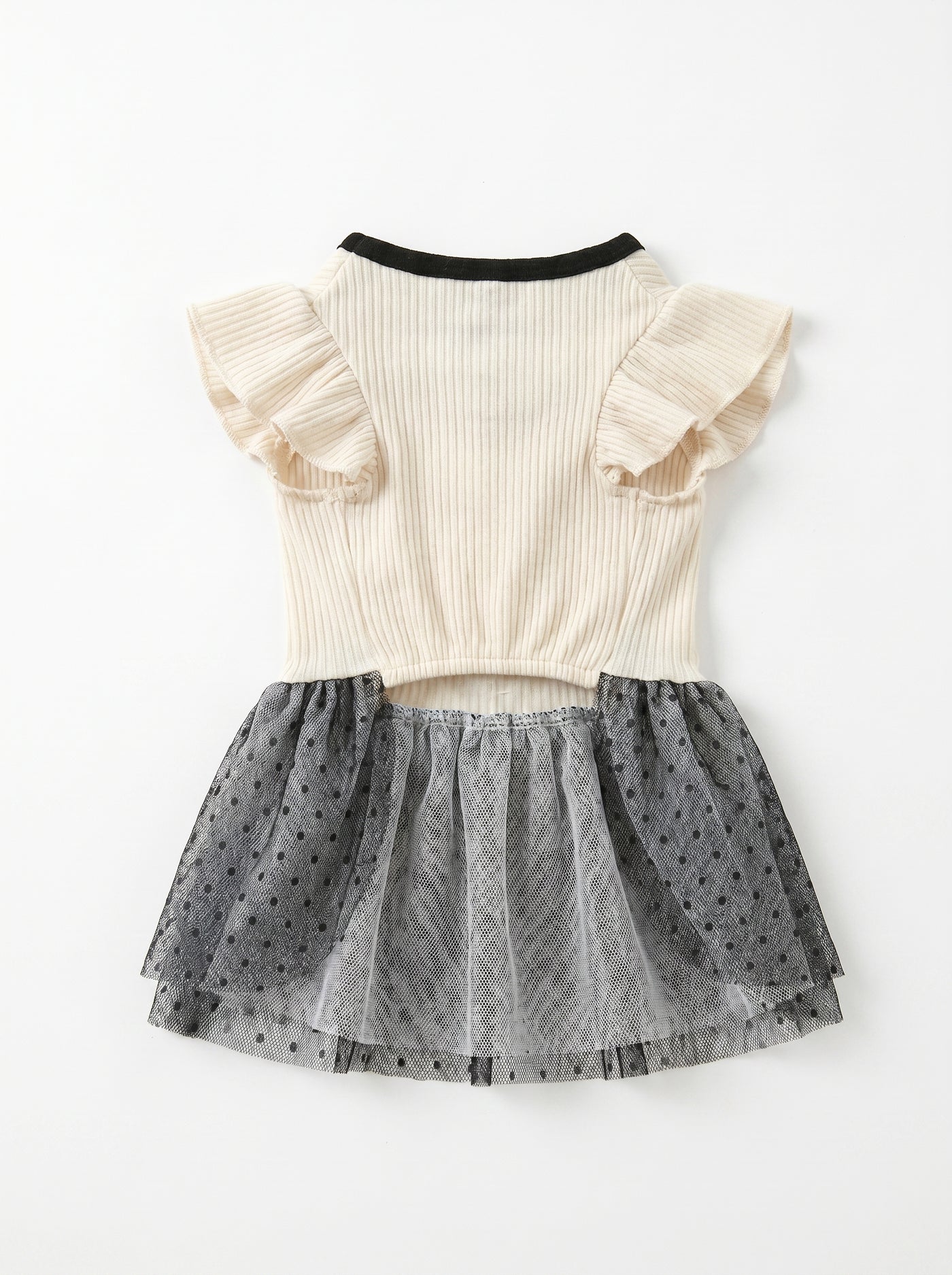 Small dog wearing Giselle dress in white outdoors – Malpetit