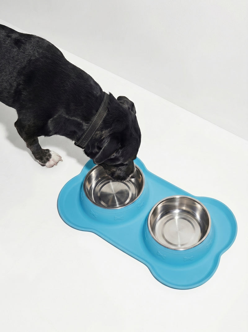 Small dog eating from double travel bowl set – Malpetit