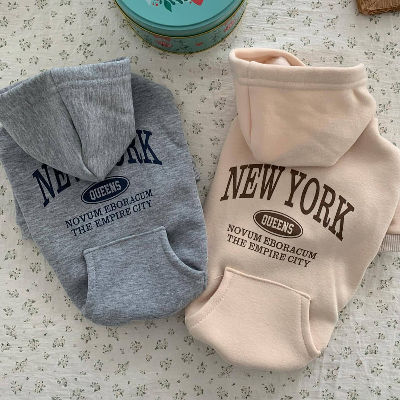 NY dog hoodies in grey and beige flat lay – Malpetit