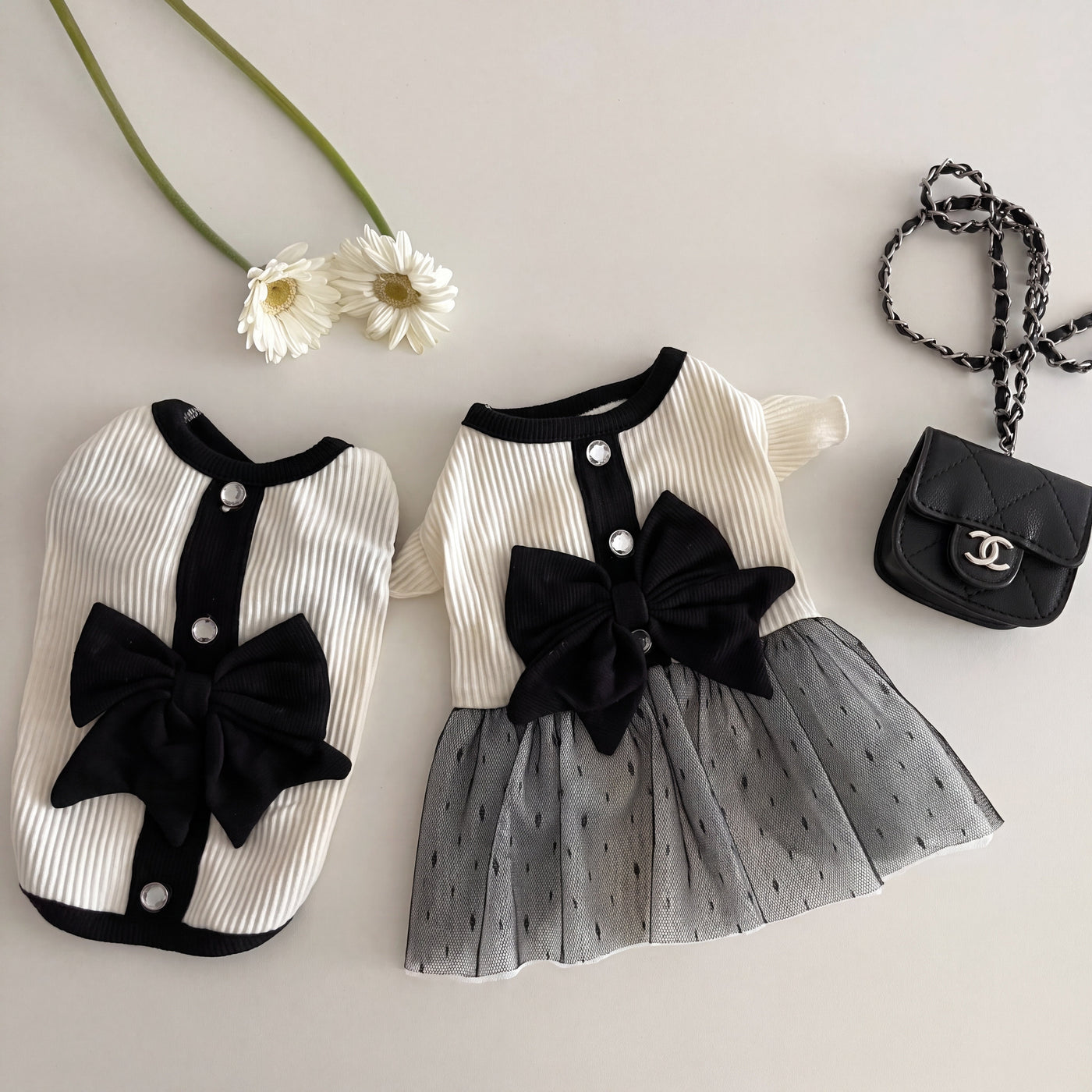 Giselle dog suit and dress in white flat lay with bow details – Malpetit