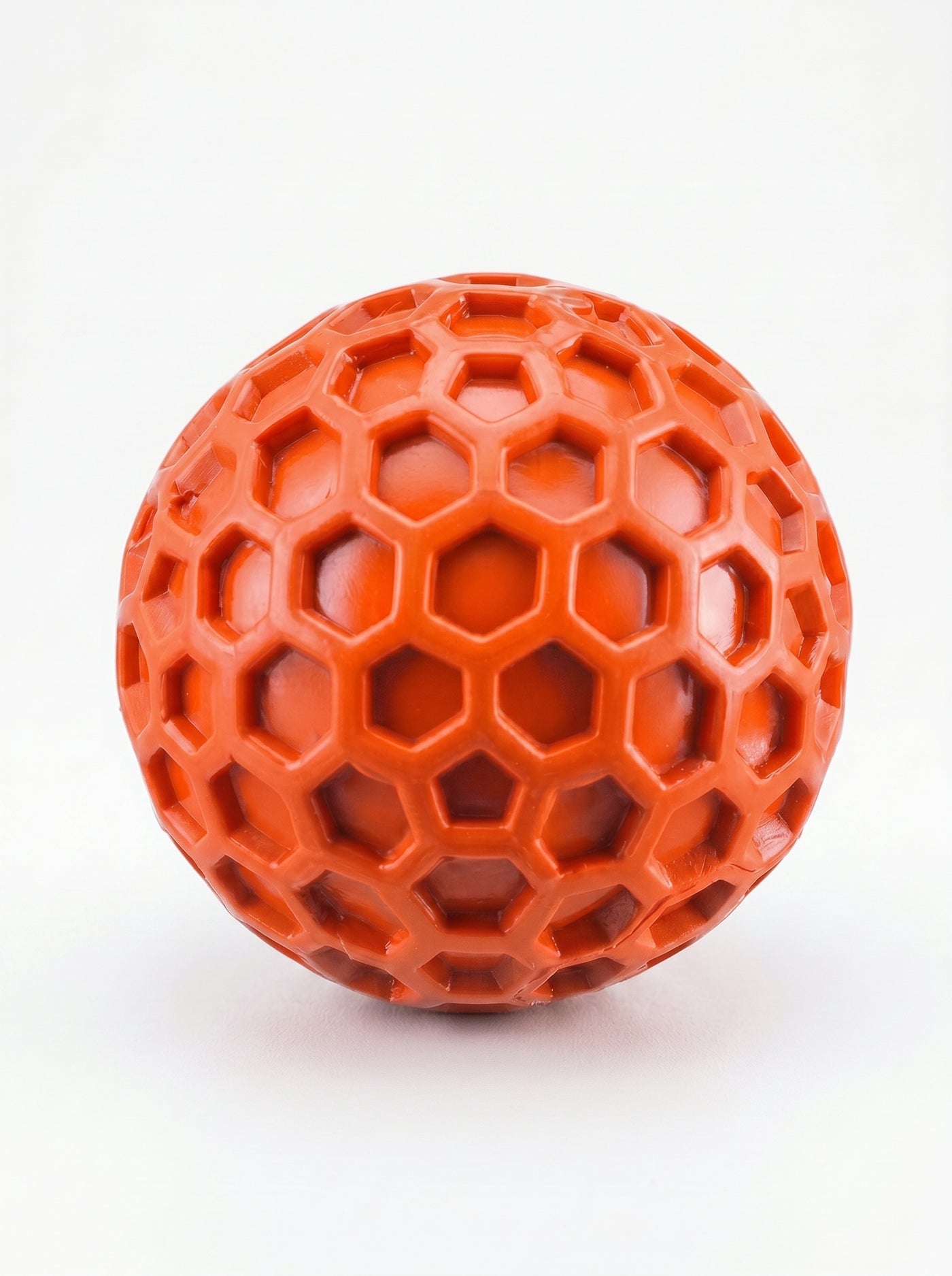 Durable squeaky rubber ball in orange colorway – Malpetit